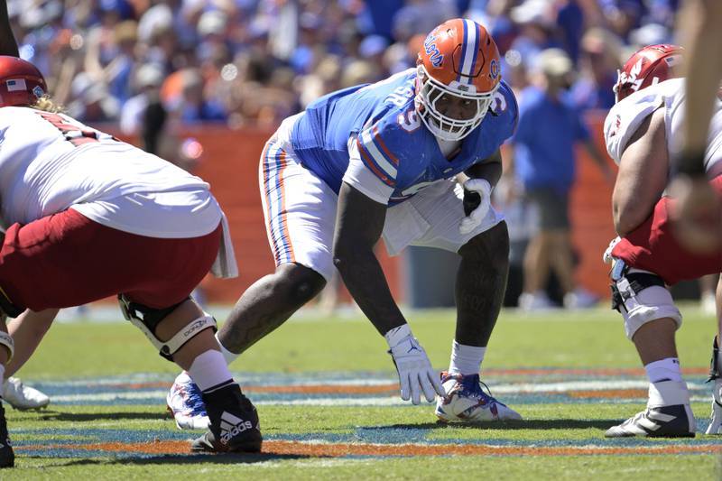 Florida defensive lineman Gervon Dexter sets up for a play against Eastern Washington during the 2022 season.