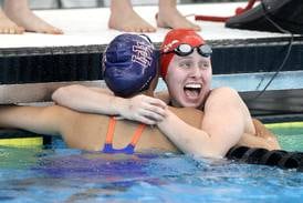 Girls Swimming: Kit Schneider races to 50 free title, leads Hinsdale Central to tie for second place