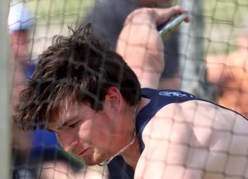Cary-Grove’s Logan Abrams competes in the discus  in Fox Valley Conference boys track and field meet action at Huntley High School in Huntley on Thursday, May 15, 2025.