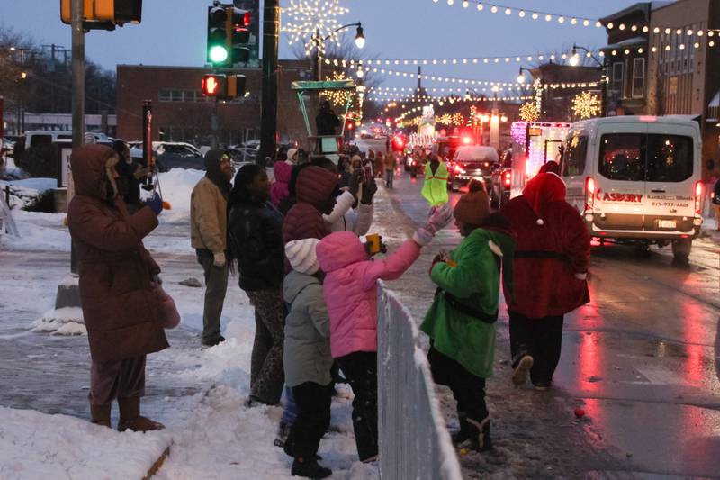 Attendees brave the cold for the Kankakee Christmas Parade on Schuyler Avenue on  Saturday, Dec. 13, 2025.
