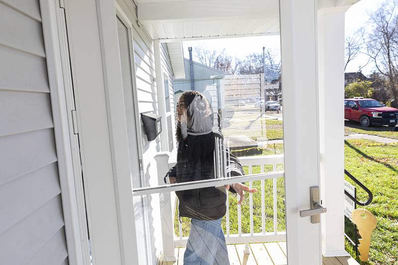 Azareya Chattic enters her new Dixon home Sunday, Nov. 23, 2025.