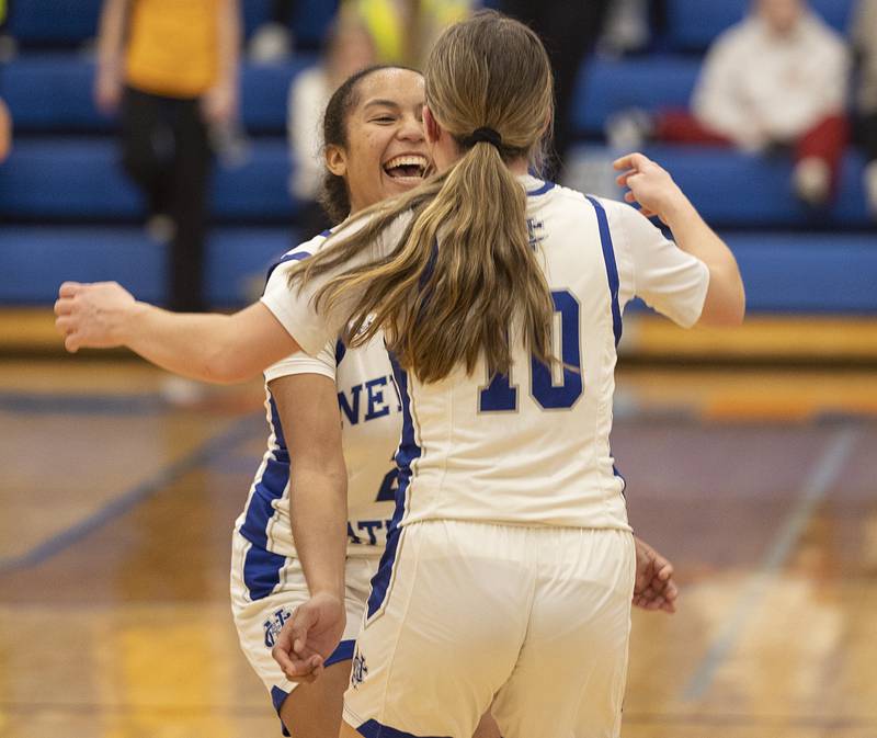Newman’s Gisselle Martin hugs Elaina Allen after the Comets’ 42-32 win over Galena Tuesday, Feb. 24, 2026, in the Class 1A sectional at Eastland High School.