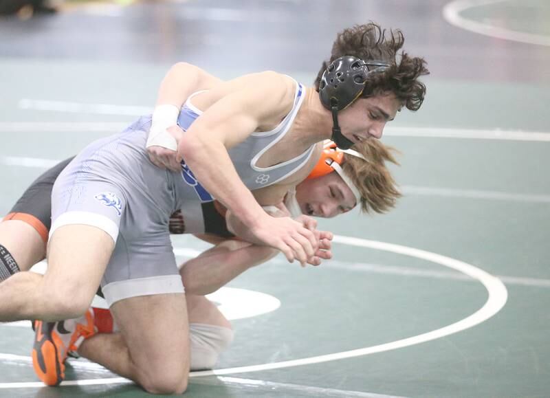 Sandwich's Cooper Corden wrestles Princeton's Ace Christiansen in the 144  pound weight class during the Class 1A Regional meet on Saturday, Feb. 8, 2025 at St. Bede Academy.