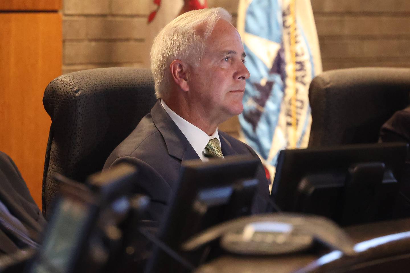 Mayor Terry D’Arcy listens to public comment on the grant for asylum seekers at the Joliet City Council Meeting on Tuesday, Oct. 3, 2023 in Joliet.