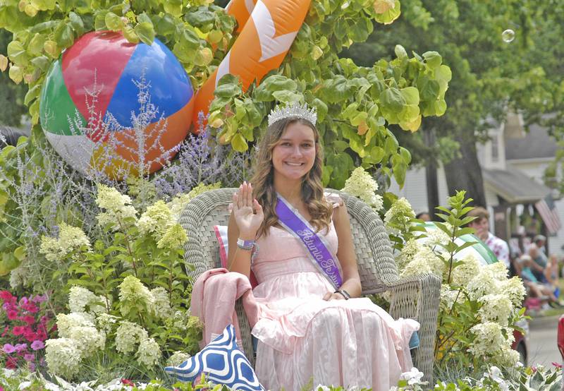 Petunia Festival Queen Daniela Lovett rides in the Dixon Petunia Fest parade Sunday,  July 6, 2025.