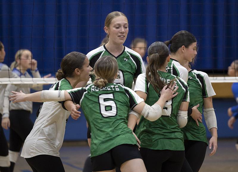 Rock Falls celebrates their first set win against Newman Monday, Oct. 28, 2024, during regional play at Newman.
