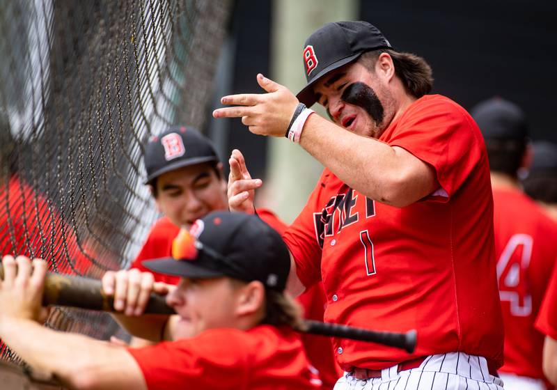 Benet Academy’s Quinn Devine celebrates a play by his teammates during a game against St. Francis High School during the Class 3A Kaneland Sectional final at Kaneland High School in Maple Park on Saturday, June 7, 2025.