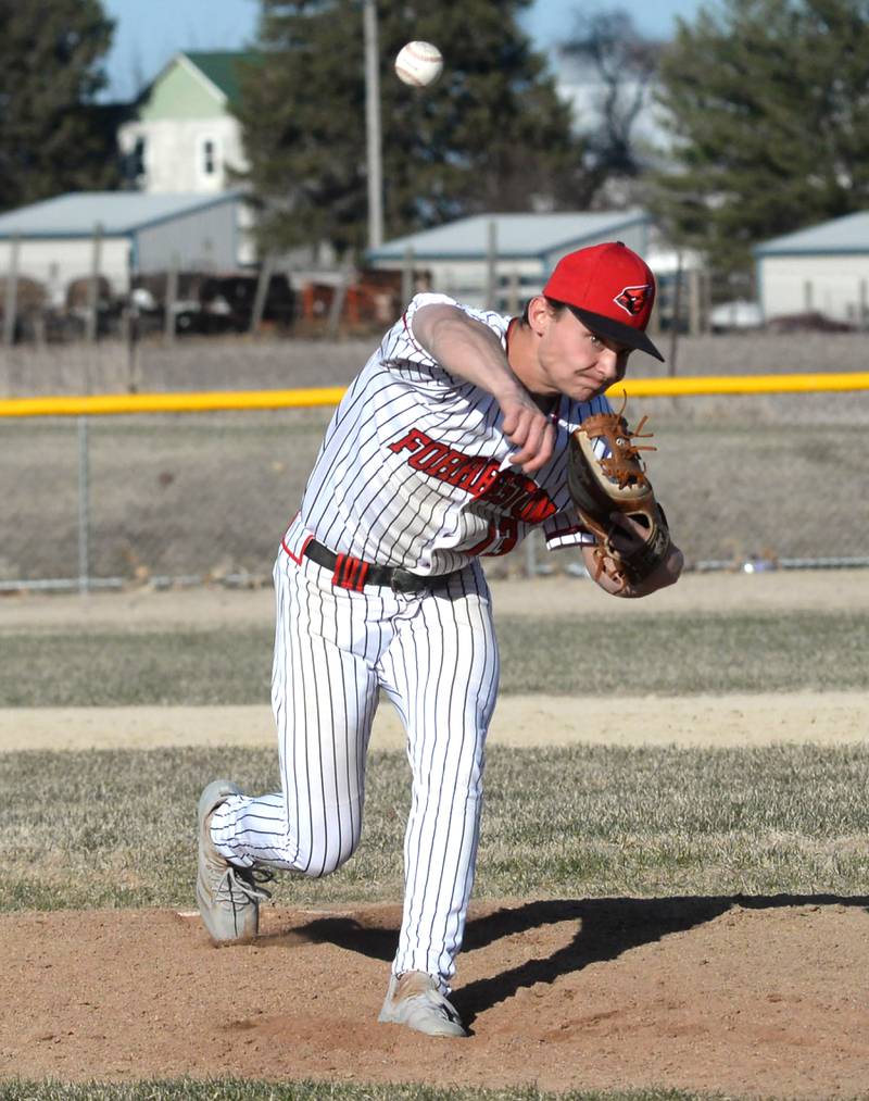Forreston's Kendall Erdmann pitches against Warren/Stockton on Friday, March 28, 2025 in Forreston. The Cardinals won the game 13-3.