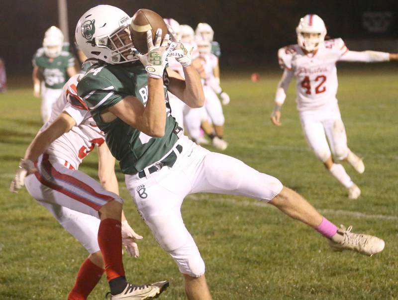 St. Bede's Phillip Gray makes a spectacular catch over Ottawa's George Shumway on Friday, Oct. 25, 2024 at St. Bede Academy.