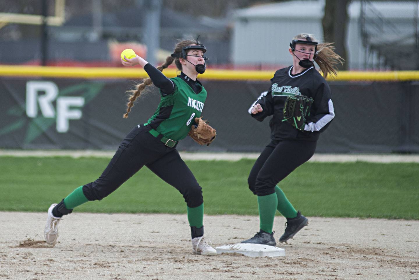 Rock Falls’ Rylee Johnson throws the first for an out against North Boone Monday, April 25, 2022.