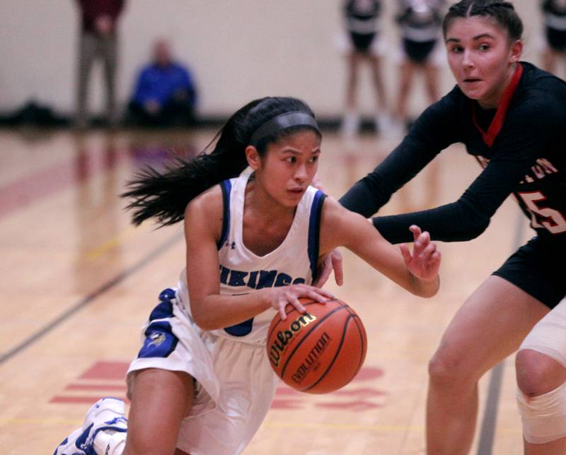 Geneva’s Rilee Hasegawa drives toward the basket during the Class 4A Schaumburg Supersectional against Barrington on Monday, Feb. 27, 2023.