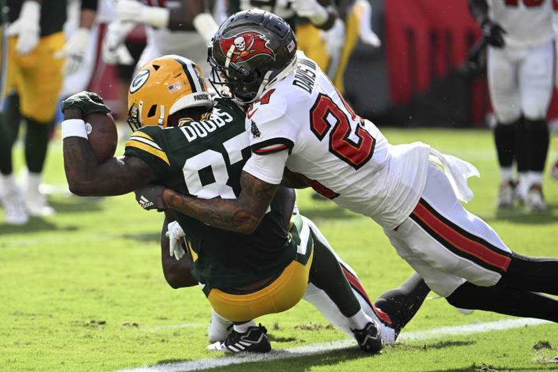 Green Bay Packers' Romeo Doubs gets into the endzone for a touchdown during the first half of an NFL football game Sunday, Sept. 25, 2022, in Tampa, Fla. (AP Photo/Jason Behnken)