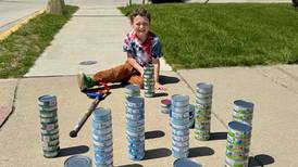 Marseilles boy again collecting tuna for the Marseilles Food Pantry