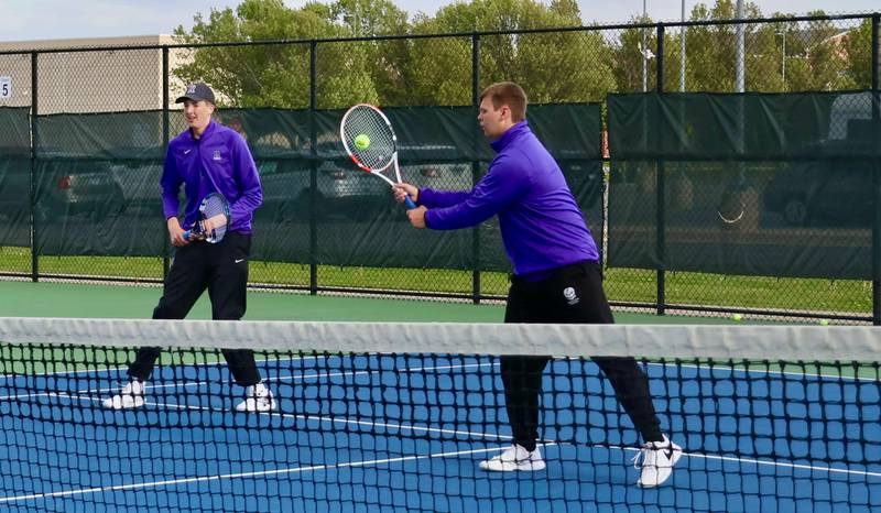 Rochelle's Parker Slattengren hits a shot during the Hubs' dual meet with St. Bede.