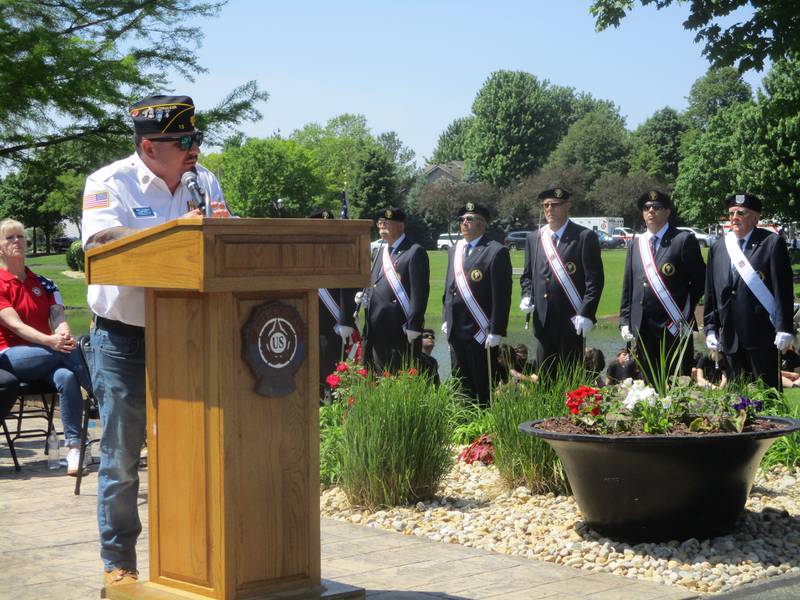 James Castaneda, commander of American Legion Marne Post 13 in Plainfield, expresses appreciation for the large turnout for a Memorial Day service at Settlers' Park in Plainfield on Monday. May 25, 2026