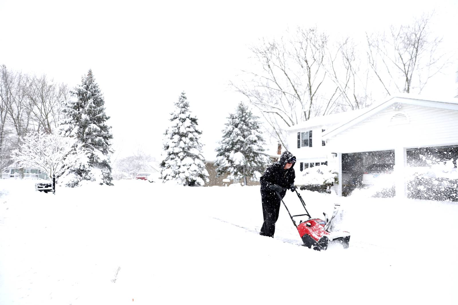 Photo Gallery Another several inches of snow piles on Kane and DuPage