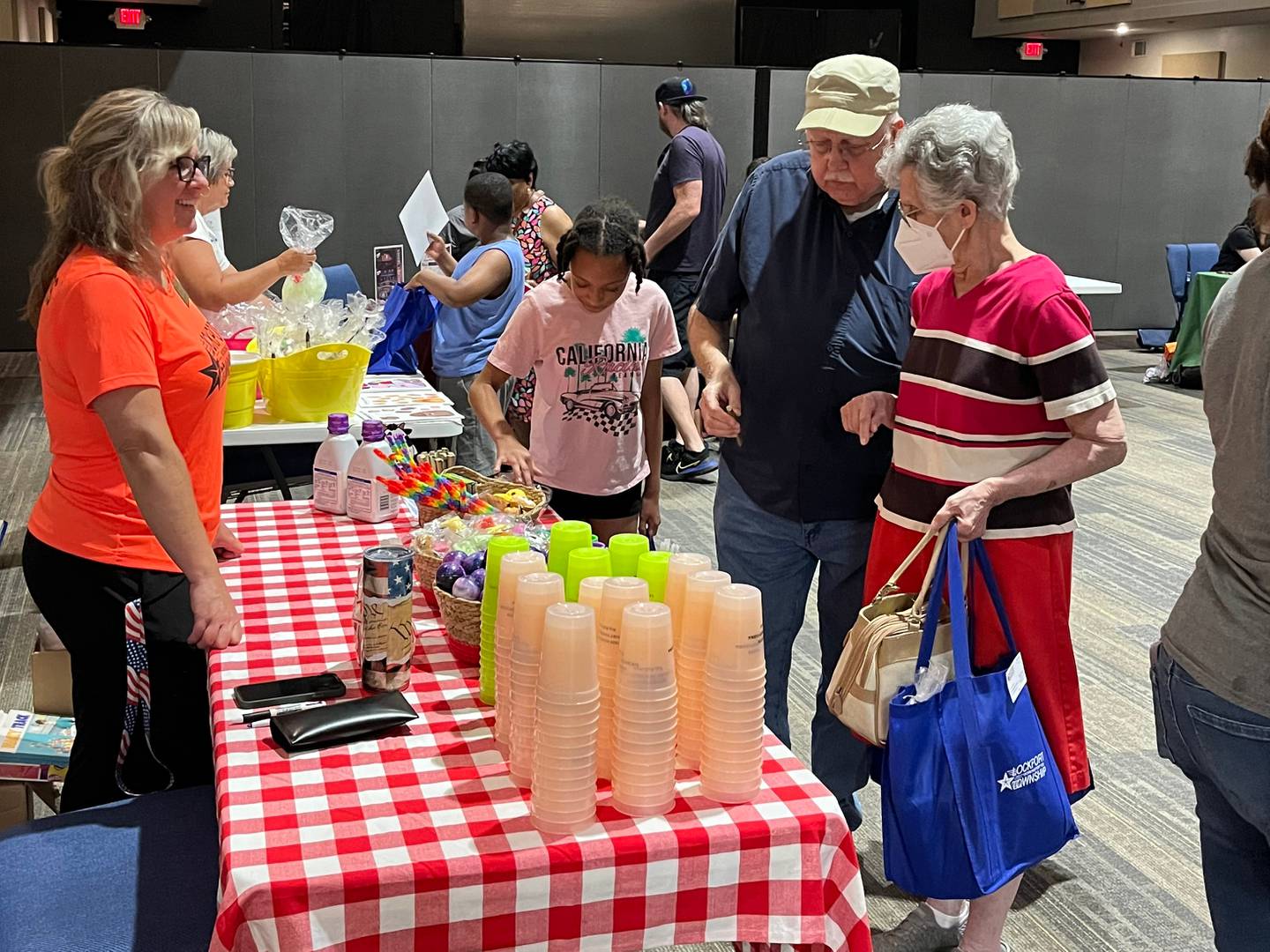 Township Clerk Erin Haas Gotts talking to residents during the school supply give away.