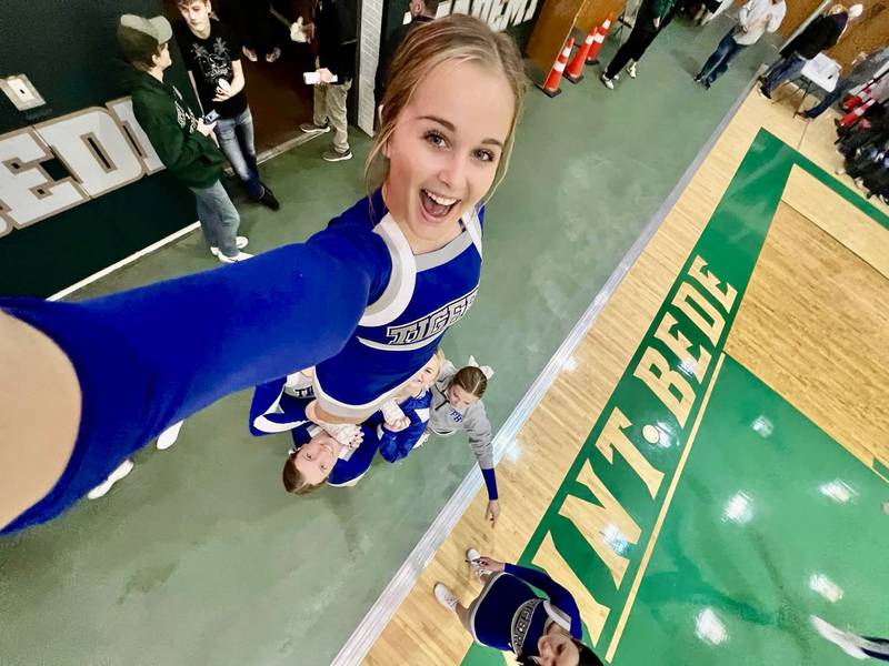 Senior Madison Doran and the Princeton High School cheerleaders will go to no extremes to lead the cheers for the Princeton Tigers basketball team.