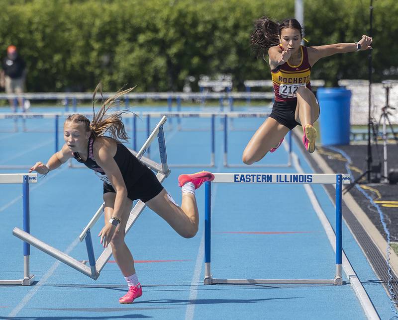 Richmond-Burton’s Angelina Gersch (right) clears the final hurdle in the 2A 300 hurdles Saturday, May 20, 2023 during the IHSA state track and field finals at Eastern Illinois University in Charleston.