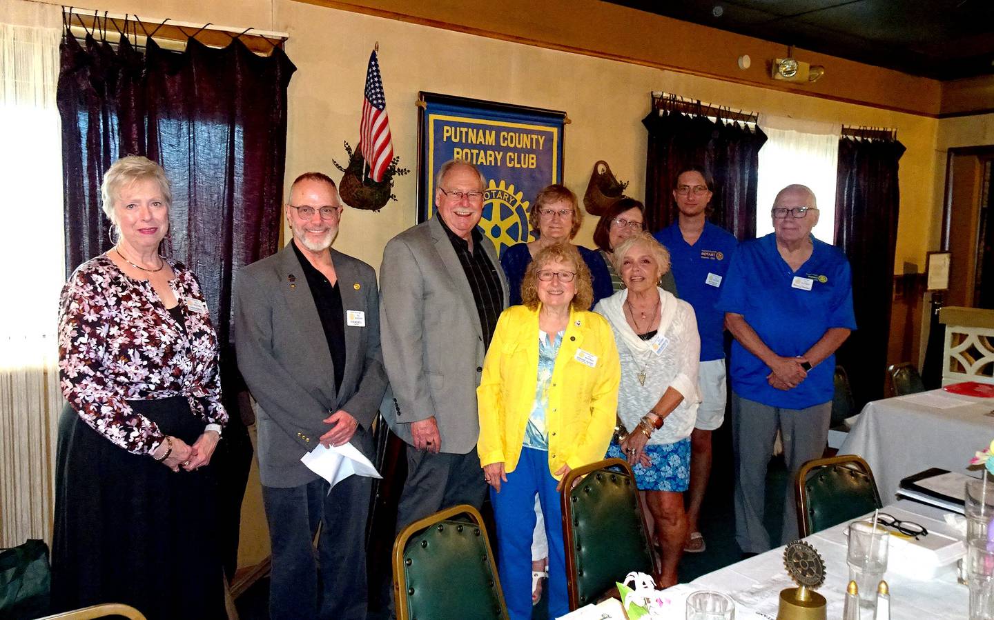 New board members installed at Putnam County Rotary’s annual banquet included (standing from left): President Cheri Adrian, Pastor Ron McNeill, Scott Shore, Brenda Bickerman, Nancy Burress, Matt Miller and Barry Chrenen; and in front, outgoing President Adriane Shore and her predecessor, Debbie Buffington.