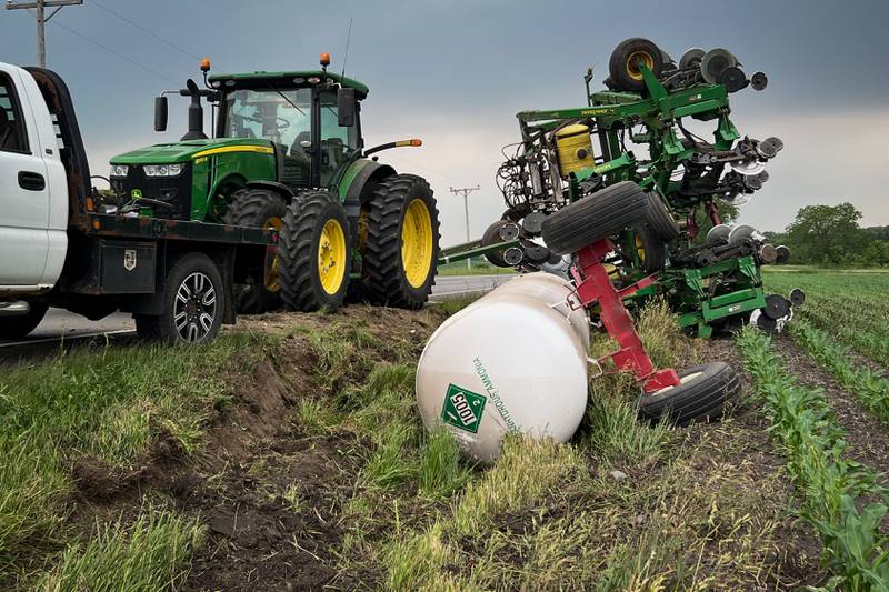 A tanker of anhydrous ammonia tipped into a ditch Monday, June 12, 2022, north of Marengo. The tanker did not spill any o the chemical, Marengo Fire and Rescues said.