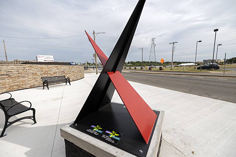 A sculpture, donated to the city of Rock Falls as part of the Art in the Park project, commemorates the rise and fall of manufacturing jobs in the twin cities. Titled “Demise,” artist Phil Mattox designed and donated the work. The sculpture sits at the foot of the First Avenue Bridge.