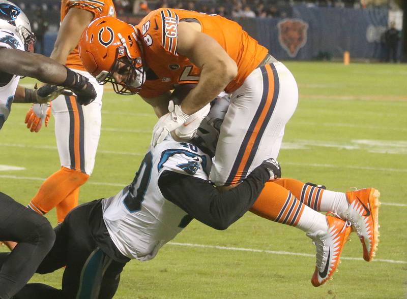 Carolina Panthers linebacker Dieon Jones makes a tackle on Chicago Bears tight end Cole Kmet on Thursday, Nov. 9, 2023 at Soldier Field.