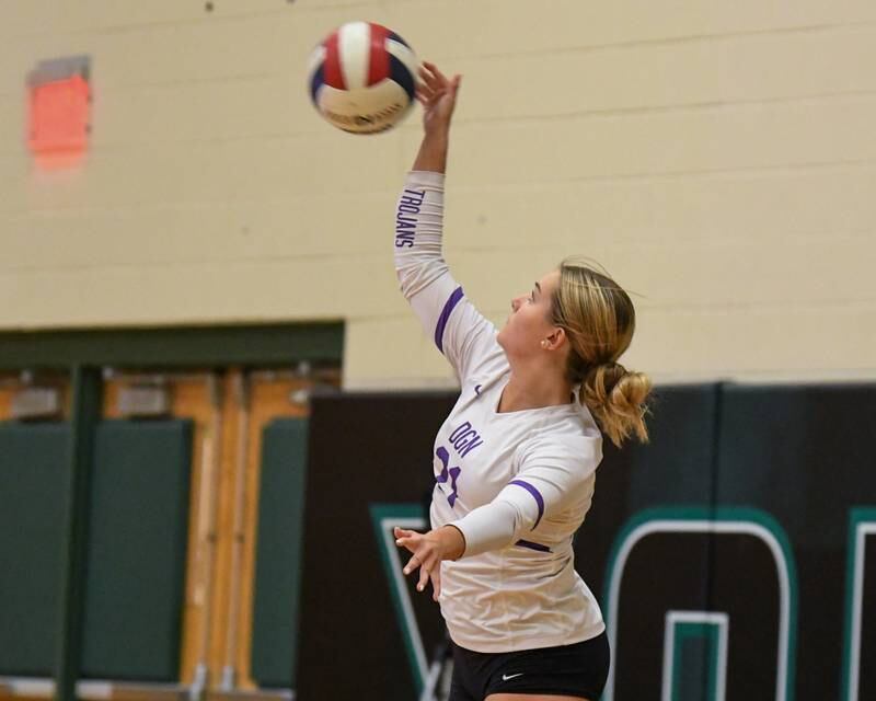 Downers Grove North's Abigail Gross (21) serves the ball during the game on Tuesday Oct. 22, 2024, while traveling to take on York High School in Elmhurst.