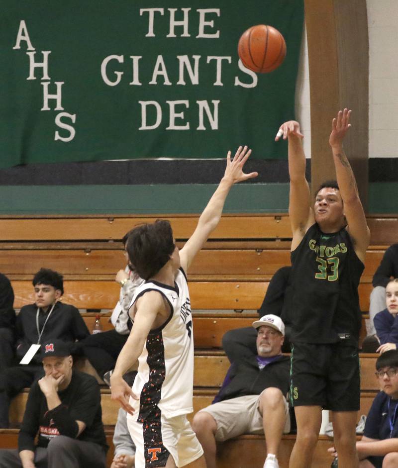 Crystal Lake South's Cooper Buelna shoots the ball over Crystal Lake Central's Jackson Hopkins during the boy’s game of McHenry County Area All-Star Basketball Extravaganza on Sunday, April 13, 2025, at Alden-Hebron’s Tigard Gymnasium in Hebron.