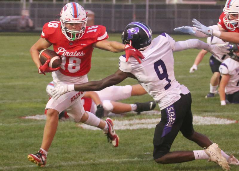 Ottawa's Jack Pongracz gets  outside of Plano's Antoine Gilford during a run down the field on Friday, Aug. 30, 2024 at King Field.