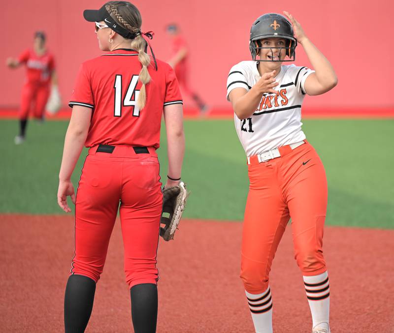 St. Charles East’s Hayden Sujack reacts after getting the first hit of the game against Barrington in an IHSA Class 4A supersectional softball game in Barrington on Monday, May 9, 2025.