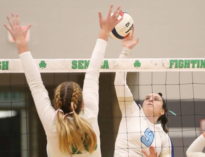 Marquette's Makayla Backos has her spike blocked by Seneca's Tessa Krull on Thursday, Sept. 19, 2024 at Seneca High School.