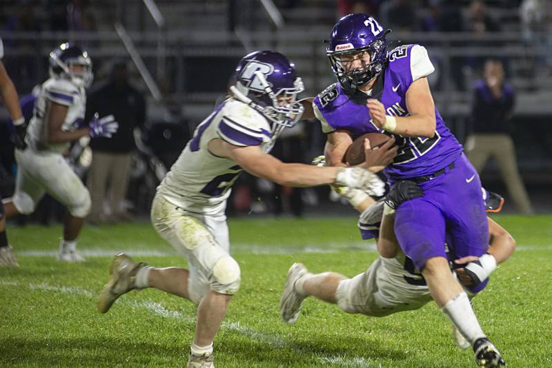 Dixon’s Aiden Wiseman looks to turn the corner against Rockford Lutheran Friday, Sept. 30, 2022.