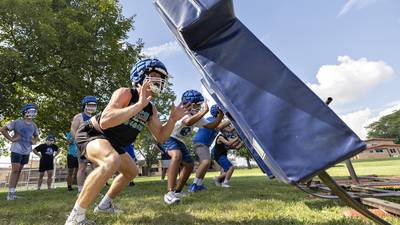 Photos: Newman football takes the practice field