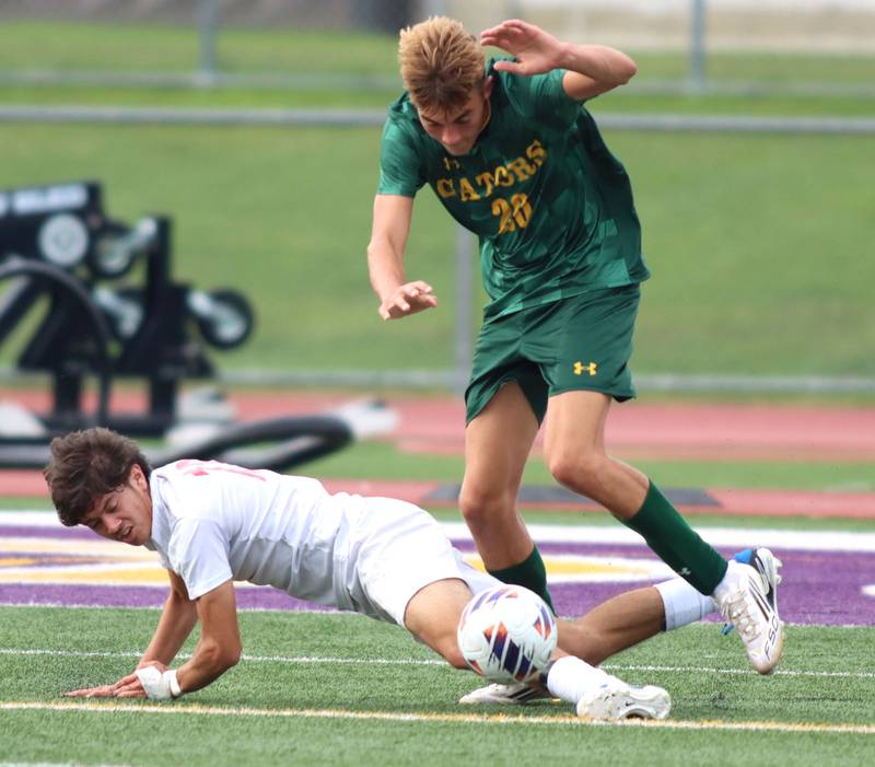 Crystal Lake South’s Vince Santarelli, top, gets tangled up with Palatine’s Mario Cruz in varsity boys soccer at Ray Porten Field on the campus of Wauconda High School in Wauconda on Wednesday, Sept. 3, 2025.