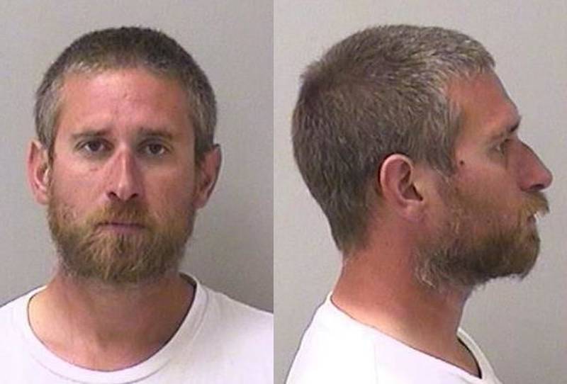 Patrick A. Cox was charged with felony criminal damage to government property and a misdemeanor charge of causing a child to be endangered.