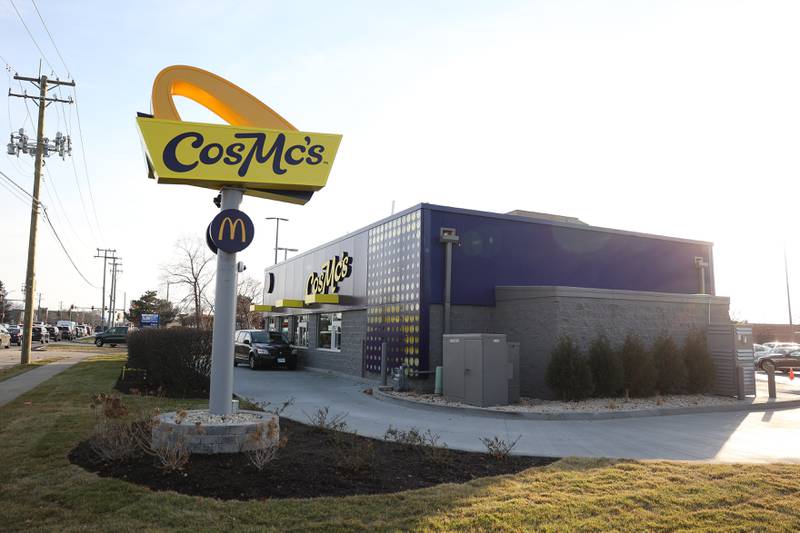 A customer picked up their order at CosMc’s, McDonald’s first small format beverage driven concept drive-thru restaurant, in Bolingbrook on Friday, Dec. 8, 2023.