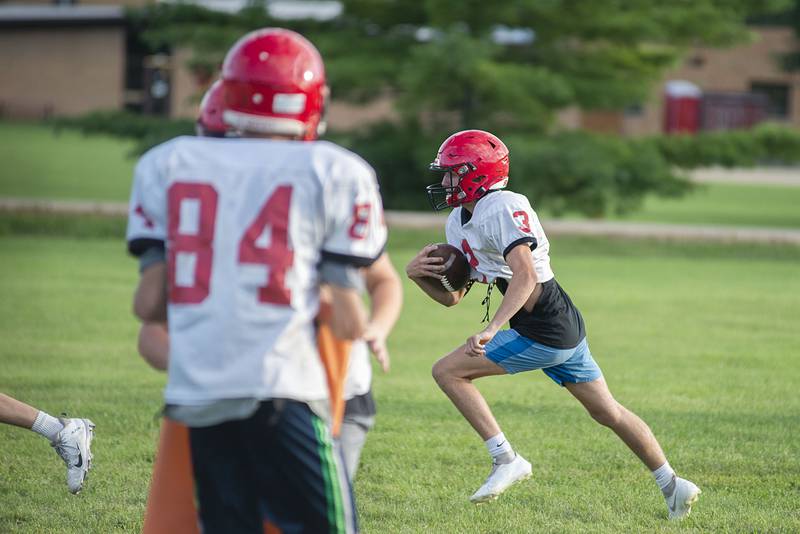 Amboy players run through drills Thursday, July 28, 2022 at the high school. First day of IHSA football practice is just over a week away for local teams.