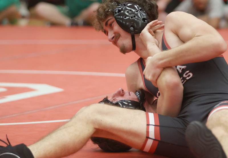 Ottawa's Ashton Houdek, pins L-P's Calvin Kudela, during a meet on Thursday Jan. 8, 2026 in Kingman Gymnasium at Ottawa High School.