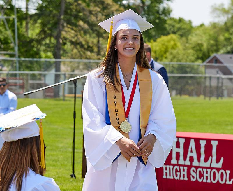 Hall salutatorian Promise Giacometti smiles after giving her speech during the graduation ceremony on Sunday May 21, 2023 at Hall Township High School.