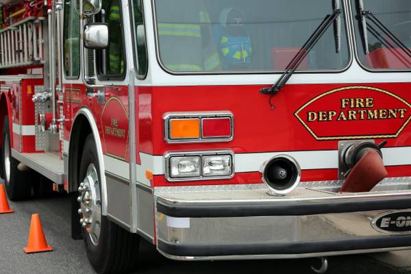 Geneva resident sustains heat-related injury after fire engulfs three-car garage