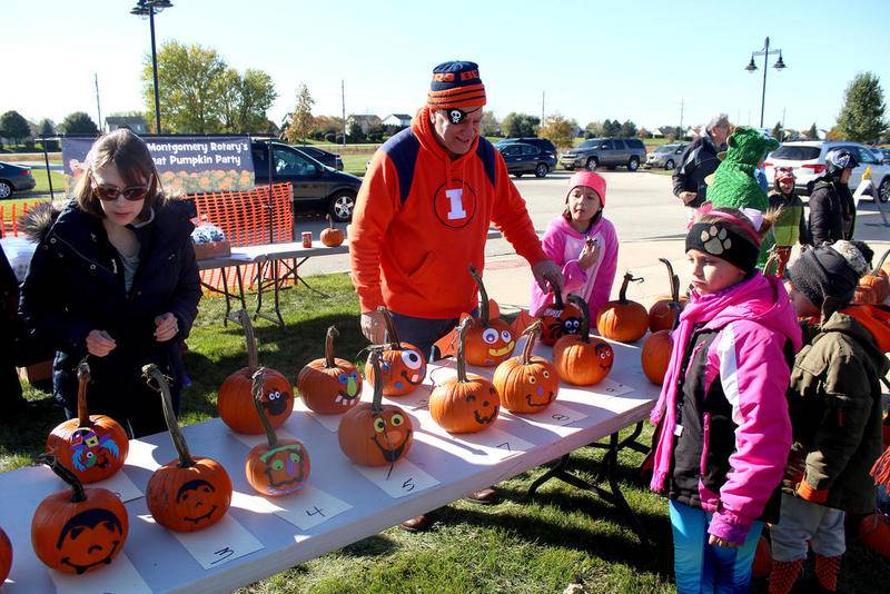 The Rotary Club of Montgomery provided families at the Montgomery Police Department's annual Halloween safety event on Sunday with small pumpkins and design kits for fun and easy to do pumpkin decorating before Halloween.