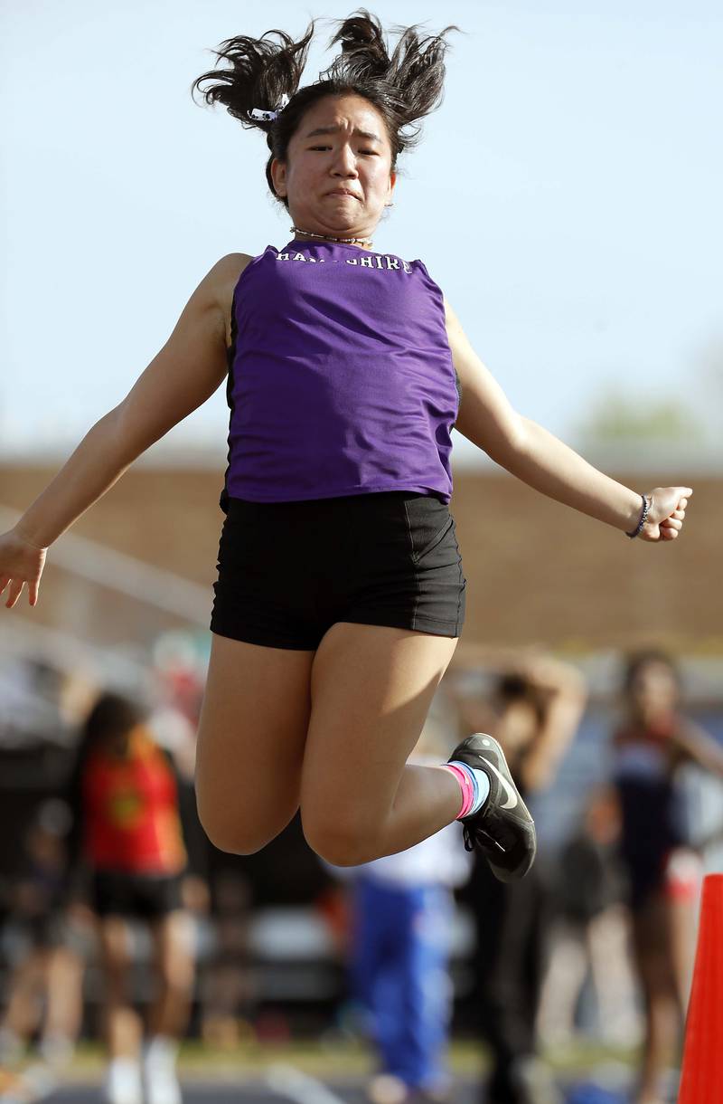 Claudia Kuk, of Hampshire competes in the long jump during the Kane County girls track and field meet Thursday April 27, 2023 in Aurora.