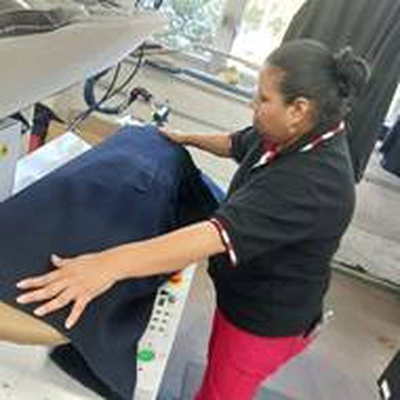 Candalaria Bella processing some of last year’s donations at Zengeler Cleaners’ Park Avenue store