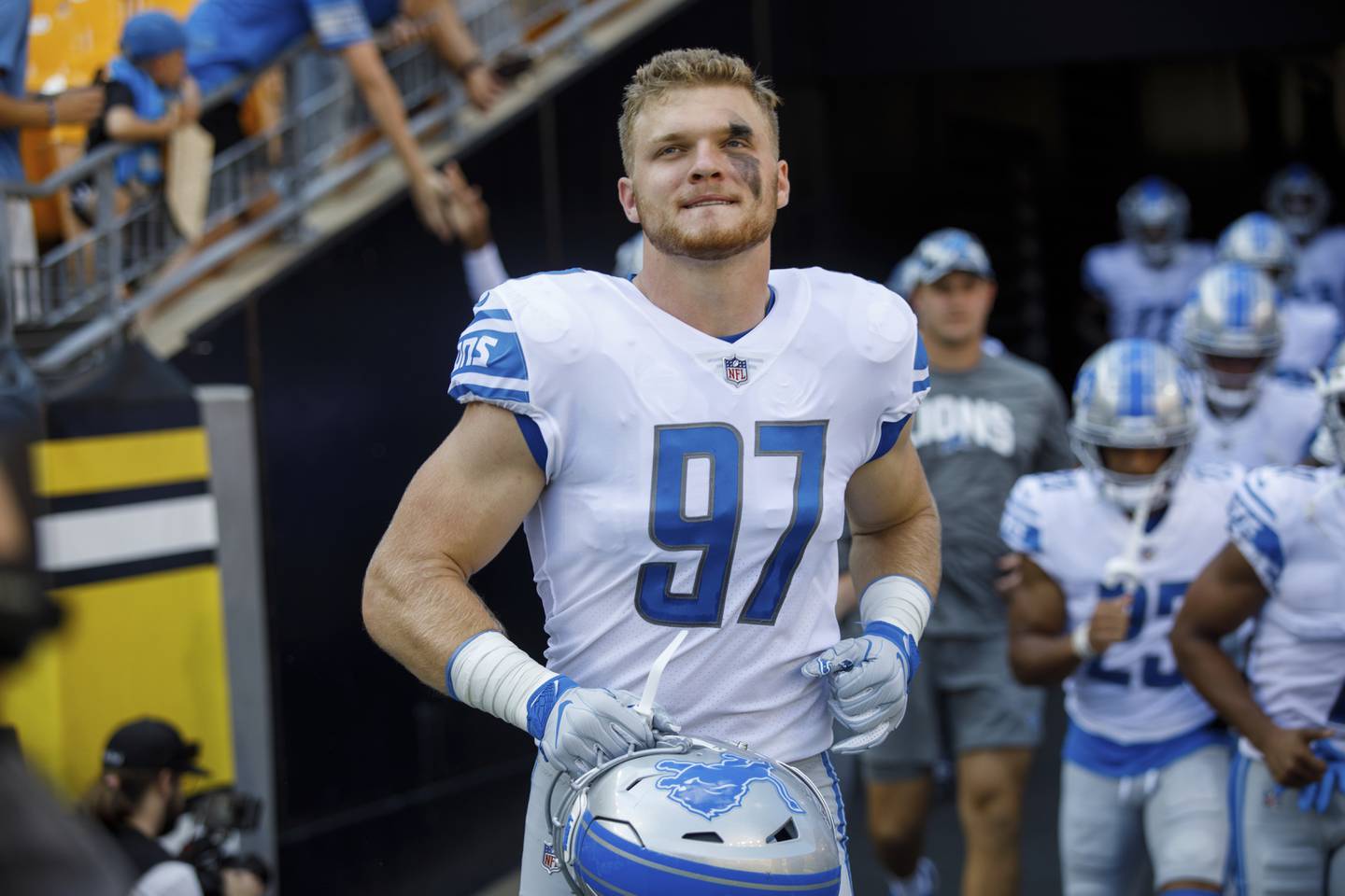 Detroit Lions defensive end Aidan Hutchinson (97) runs onto the field before a preseason NFL football game, Sunday, Aug. 28, 2022, in Pittsburgh, PA. (AP Photo/Matt Durisko)