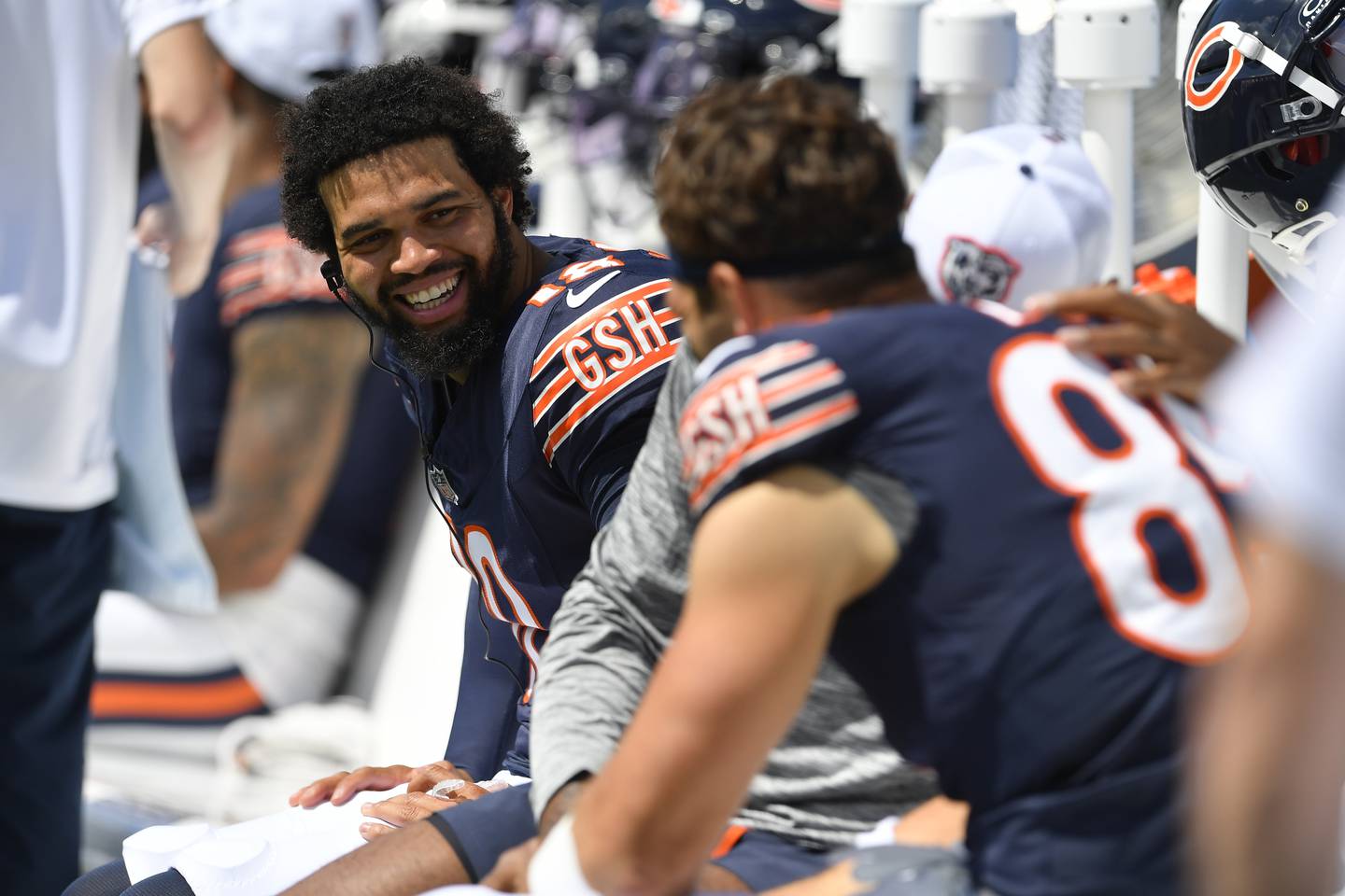Chicago Bears quarterback Caleb Williams talks with teammates during the first half of an preseason NFL football game against the Buffalo Bills, Saturday, Aug. 10, 2024, in Orchard Park, NY. (AP Photo/Adrian Kraus)