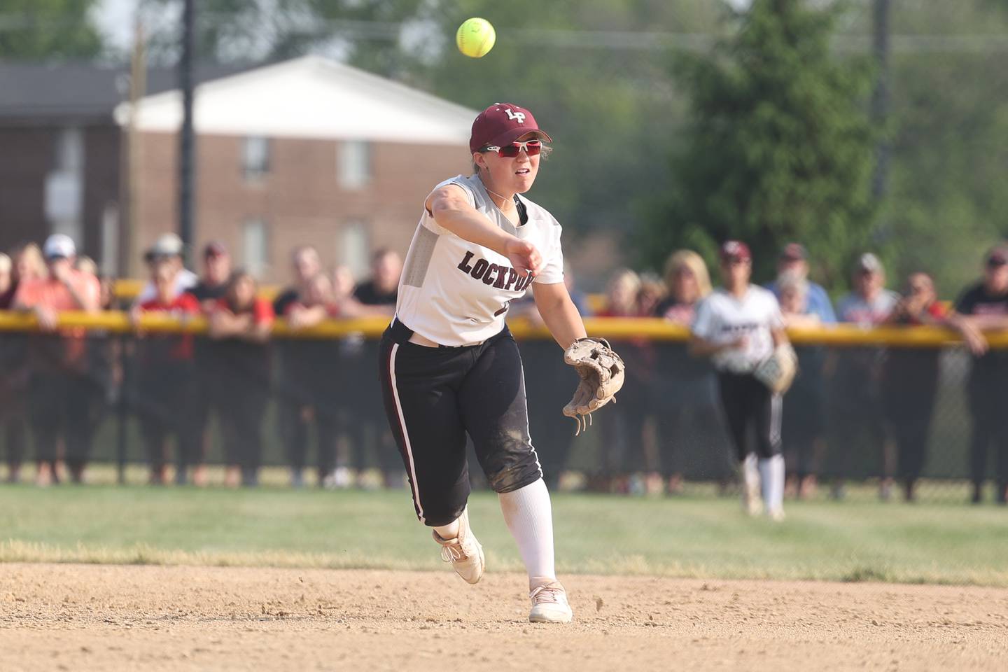 Lockport’s Sarah Viar throws to first against Marist in the Class 4A Marist Supersectional on Monday, June 5, 2023 in Chicago.