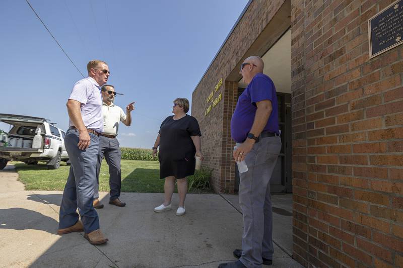 Matt Wolfort (left) and John Mahon of Bray Architects of Davenport speak with Dixon Schools superintendent Margo Empen and Kevin Schultz, director of buildings and grounds, Wednesday, August 23, 2023 about buildings on the recently purchased Nachusa Lutheran Home property. The firm was brought in to assess the condition of the buildings.