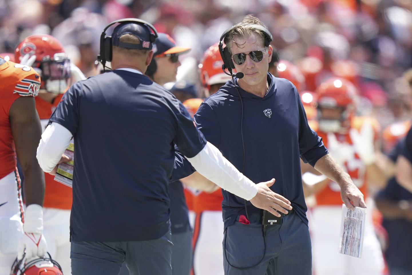 Chicago Bears head coach Matt Eberflus gives his offensive coordinator Luke Getsy five after a touchdown against the Tampa Bay Buccaneers, Sunday, Sept. 17, 2023, in Tampa, Fla.