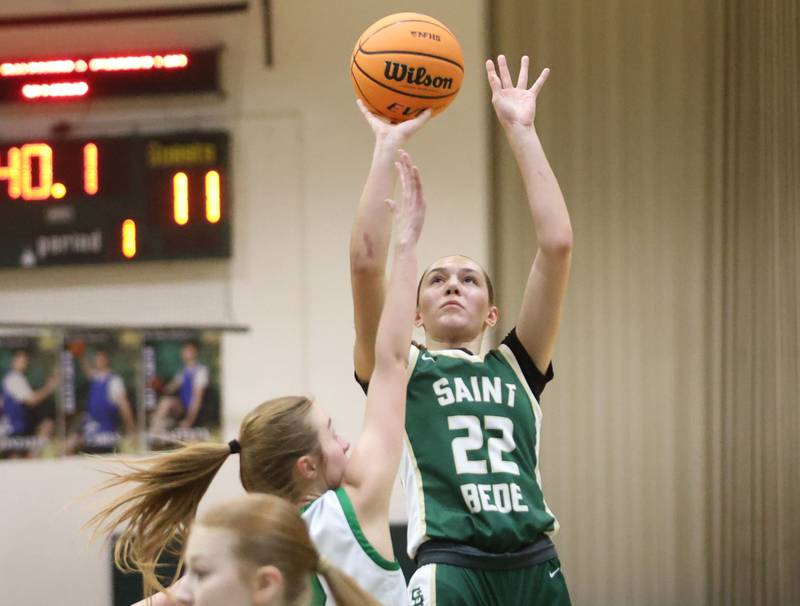 St. Bede's Hanna Heiberger shoots a jump shot over Alleman's Lindsey Britton during the Class 2A Regional finals on Thursday, Feb. 19, 2026 at St. Bede Academy.